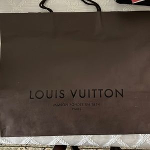 Large Louis Vuitton shopping bag.